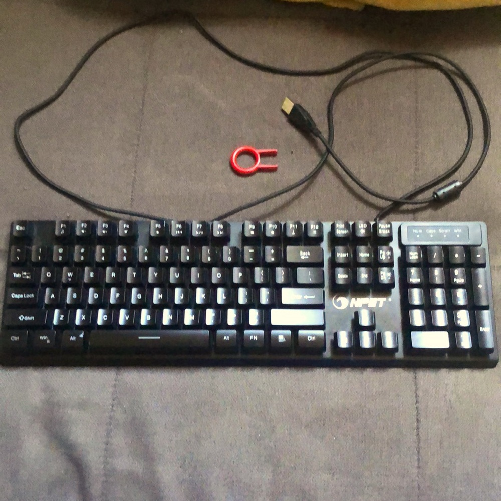 NPET Keyboard LED That has red, green, etc. In perfect condition. +Cap removal